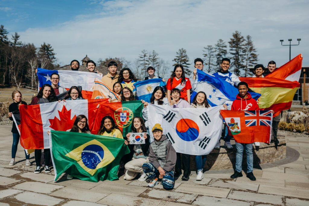 People holding flags of different countries